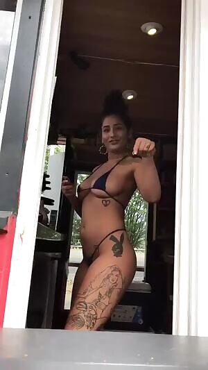 Barista showing quite a bit near the road!