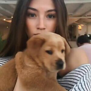 Cute girl and pupper