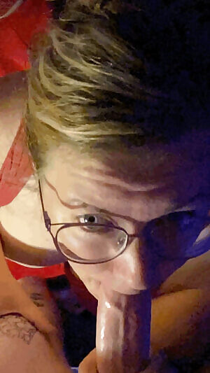 Wrapping her lips around a long thick cock