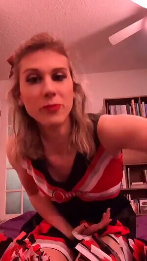 Beautiful cheerleader strokes her cock. @WonderTease