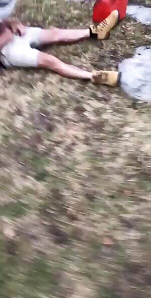 Blasting his face with piss in the yard